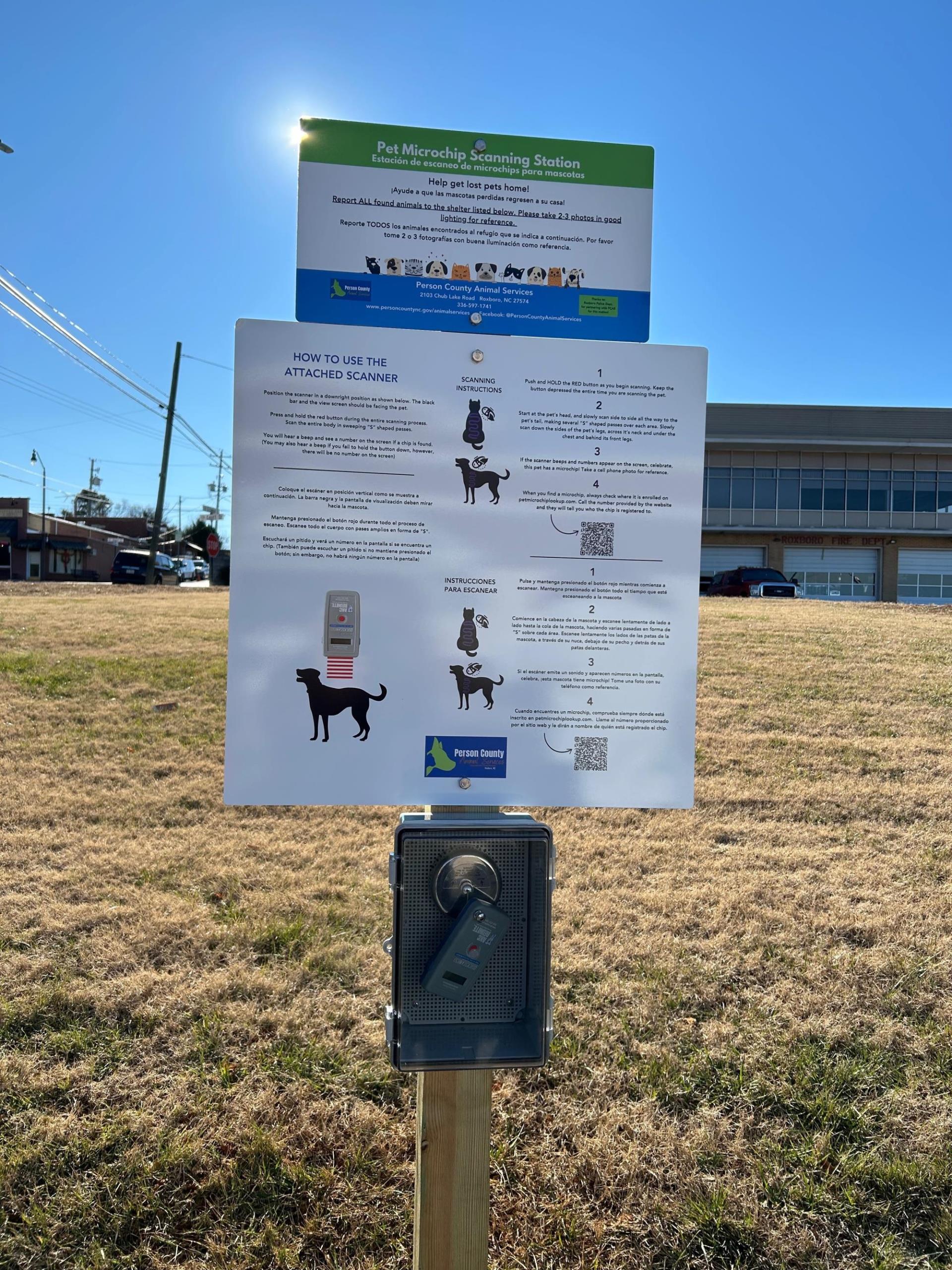 Microchip scanning station with instruction sign and scanning device located at Roxboro Police Department